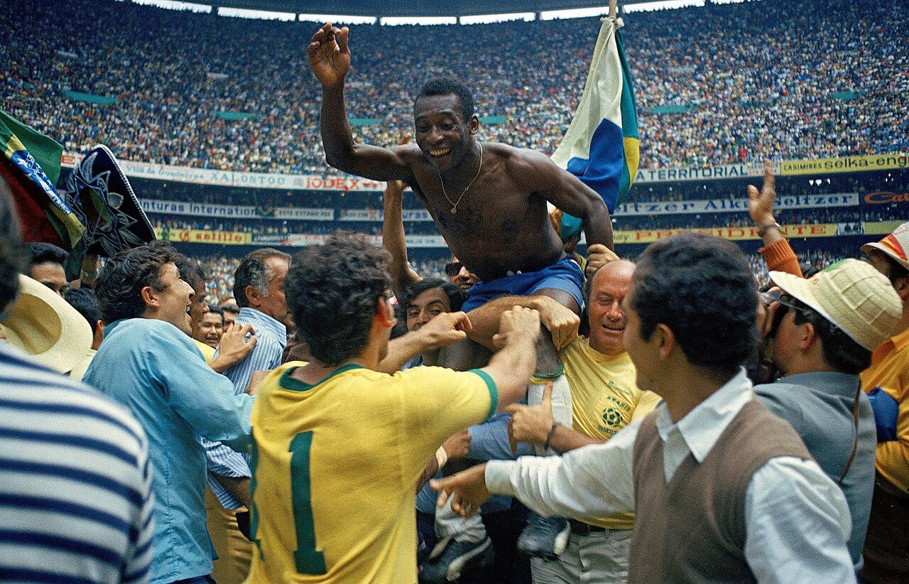 Pelé celebrating the title on June 21st, 1970. He's the only player to win three World Cups.