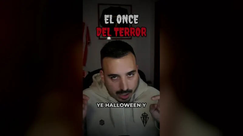 Elopi23 en su habitación con el rótulo EL ONCE DEL TERROR en letras de película de miedo